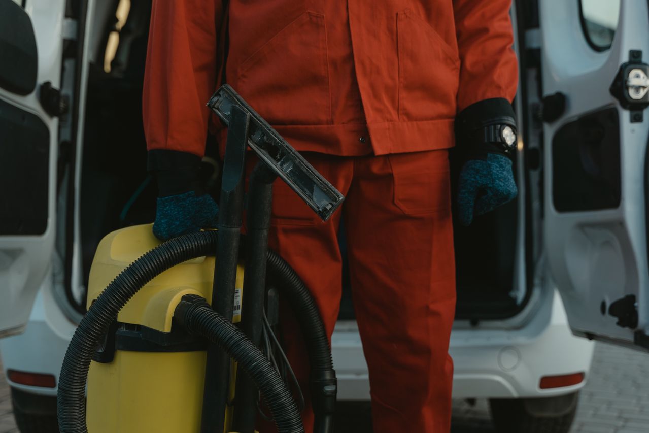 Compressed air being used to clean a workshop area
