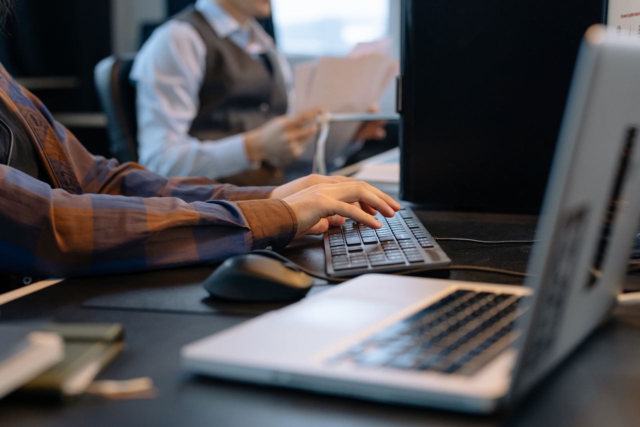 Employee managing a digital business workflow